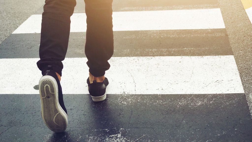 pedestrian crossing a street legally