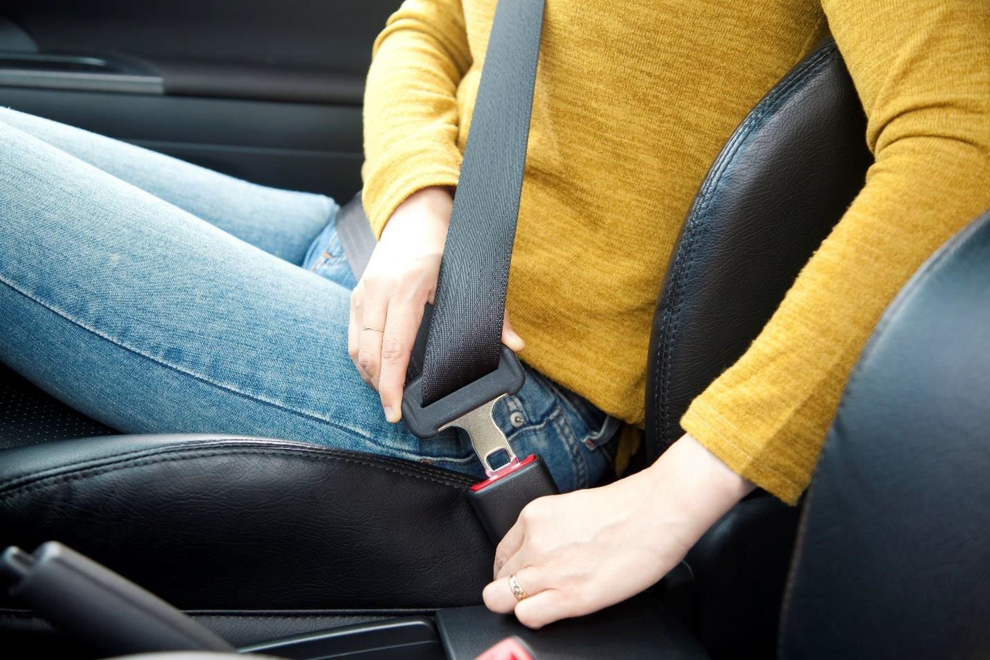 Girl Fastening Seatbelt - Johnson Attorneys Group